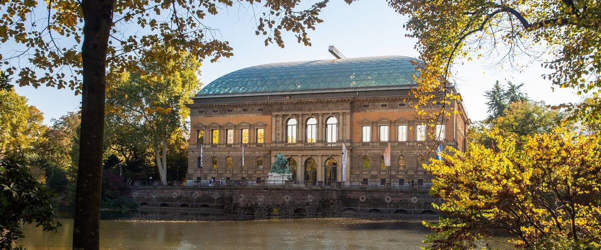 Düsseldorf Government Region which includes a pond and heritage architecture