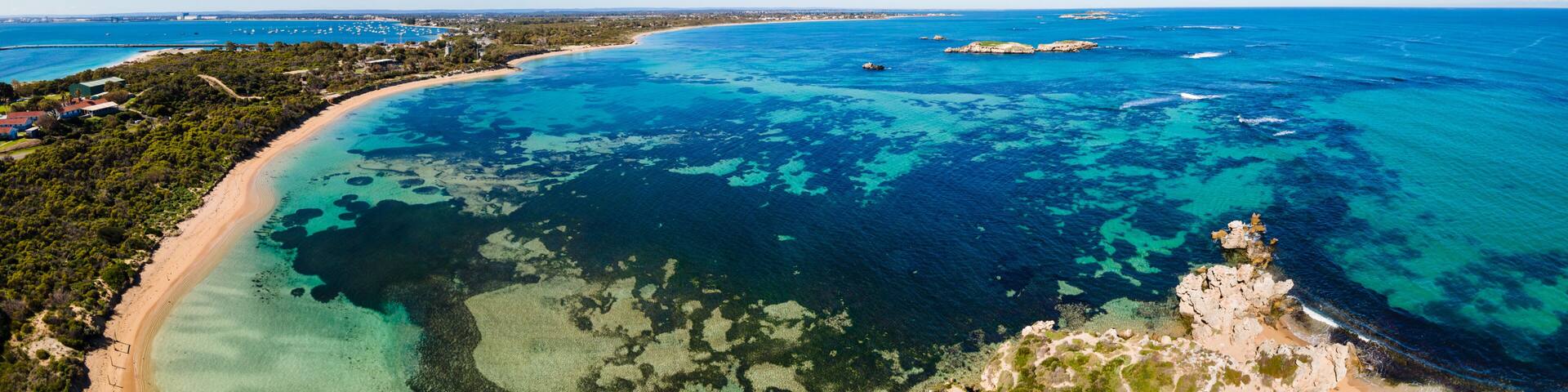 Aerial view of Point Peron and Shoalwater Bay with rocky limestone formations and seagrass.