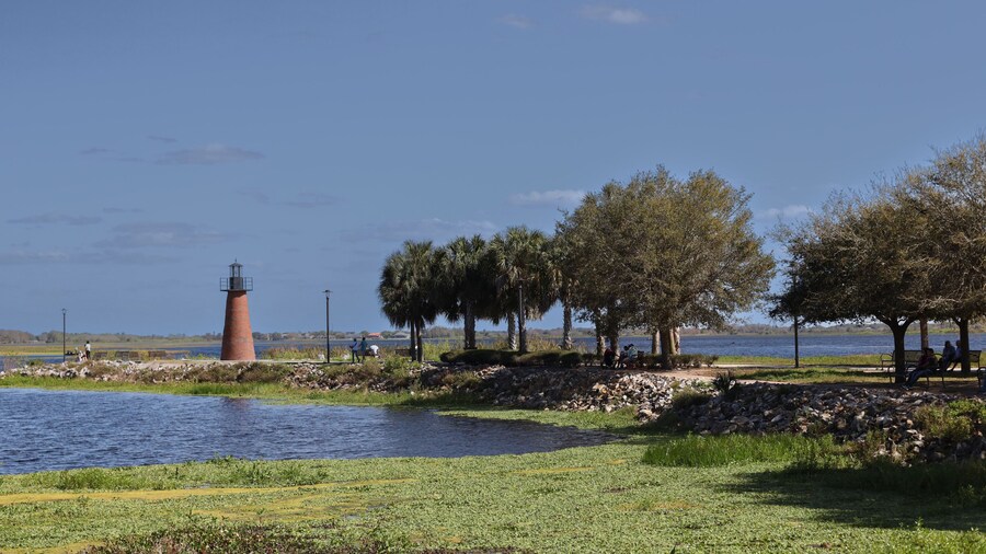 Kissimmee Lakefront Park Grassy waterfront park with walking paths, a fishing pier, picnic pavilions, and a shaded playground. children's playgrounds, splash pad