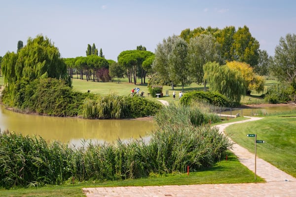 Adriatic Golf Club Cervia featuring a pond and golf
