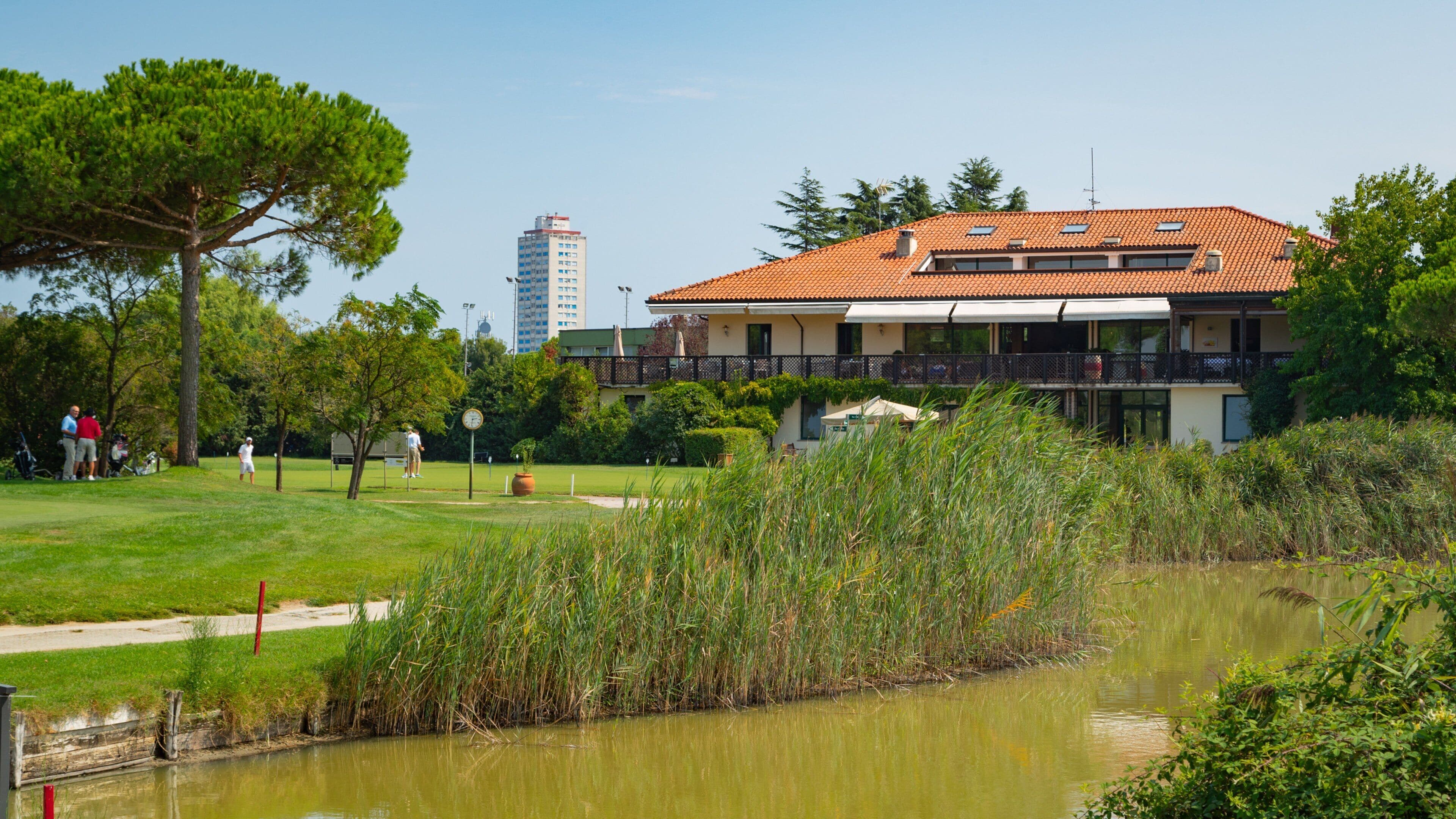 Adriatic Golf Club Cervia which includes a pond and golf