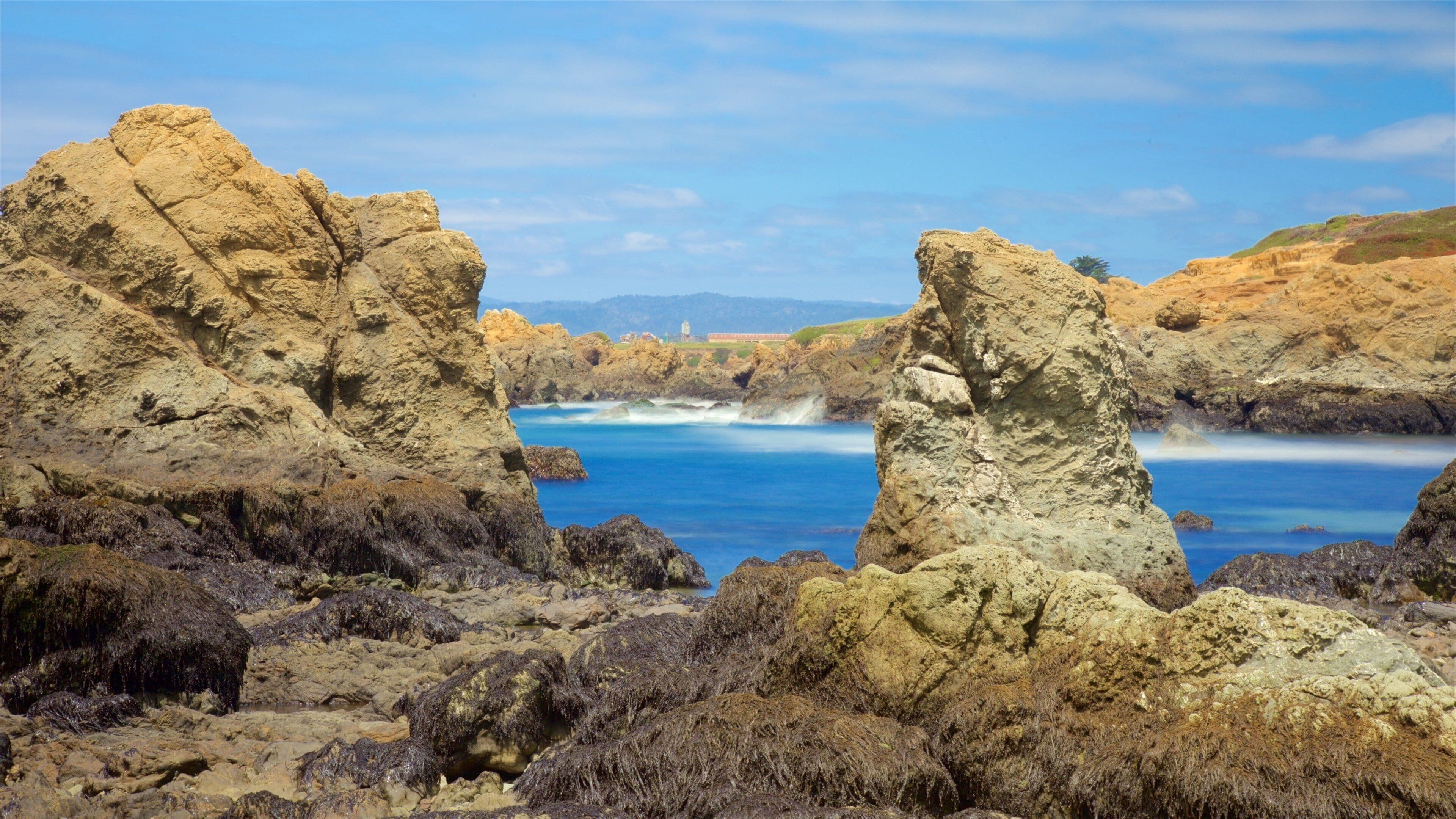 Spiaggia di Glass che include costa rocciosa e vista della costa