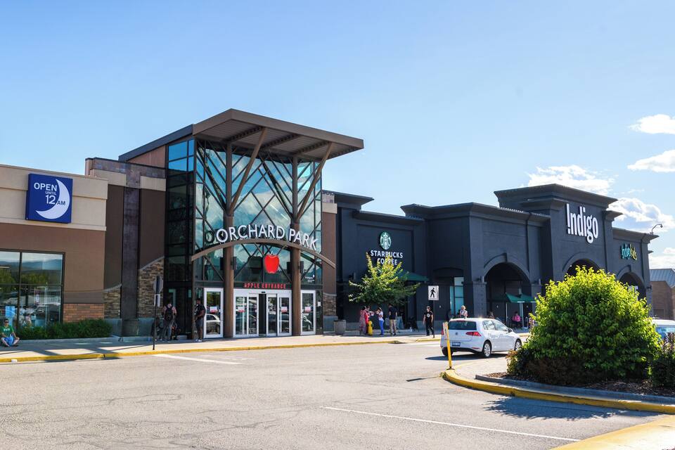 Orchard Park shopping center with Apple Store and Starbucks.
