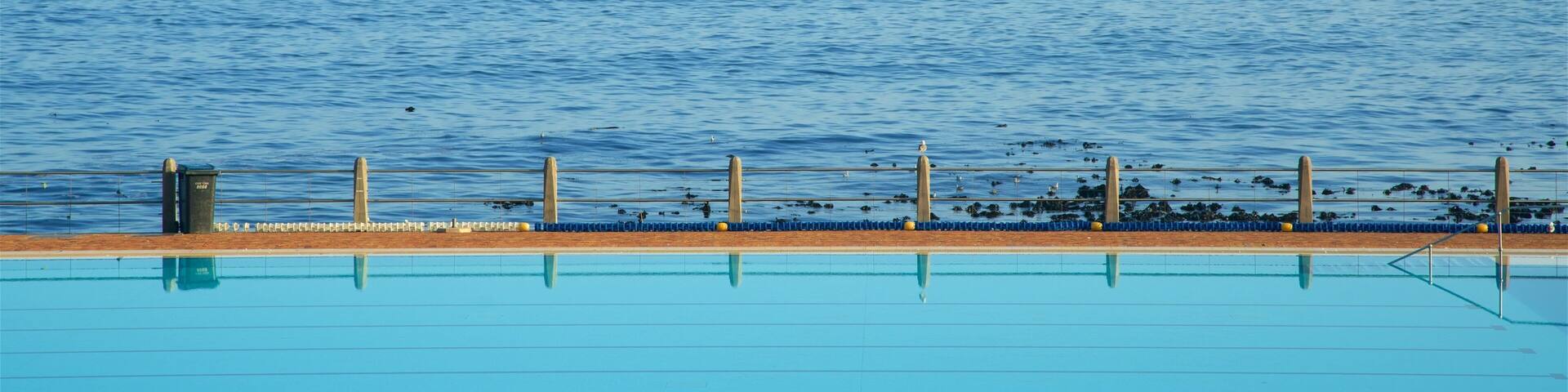 Sea Point Swimming Pool featuring a coastal town, general coastal views and a pool