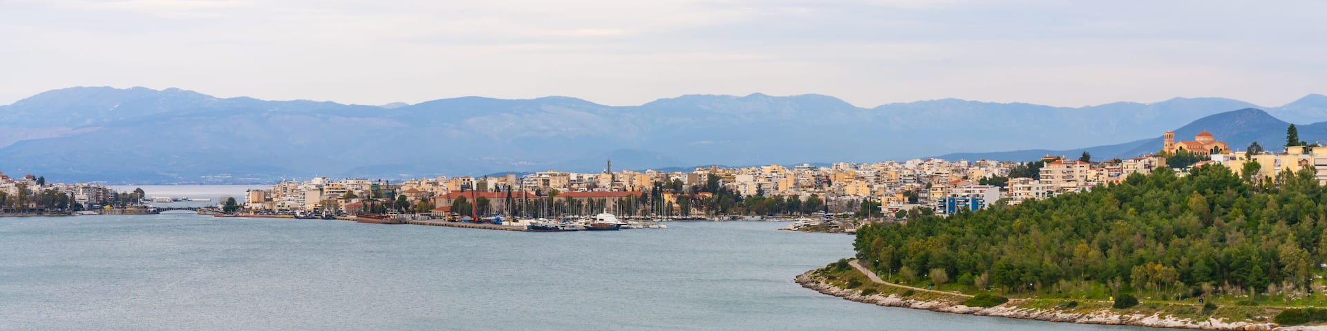 Chalcis, Greece - 10 March 2023 -The town of Chalcis on the island Evia seen from the mainland of Greece