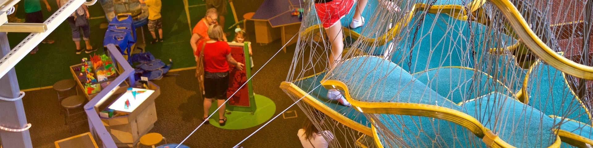 Wonderlab Science Museum featuring interior views as well as a small group of people