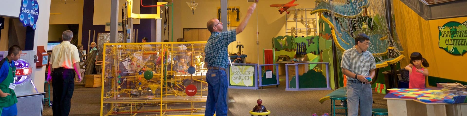 Wonderlab Science Museum featuring interior views as well as a small group of people