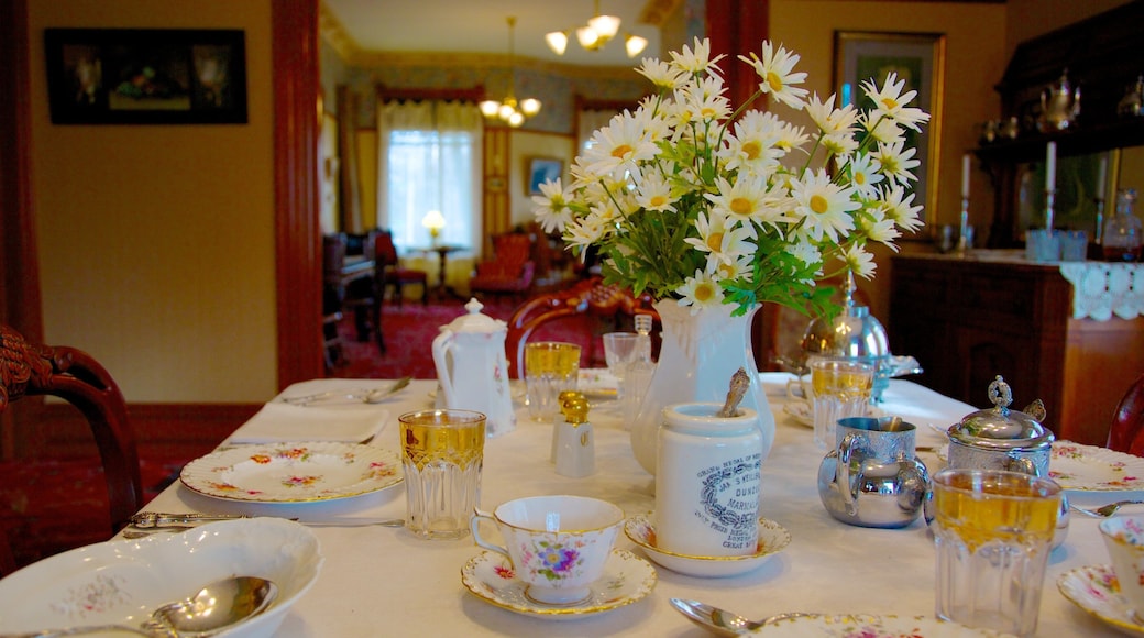Explore the dining area of Ernest Hemingway Museum in Oak Park showcasing a classic table setting with flowers