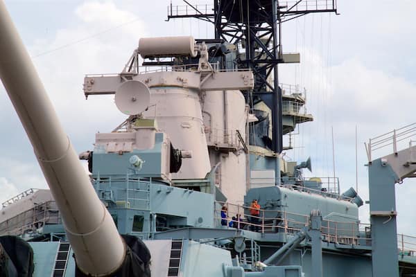 USS Wisconsin BB-64 showing military items and a bay or harbor