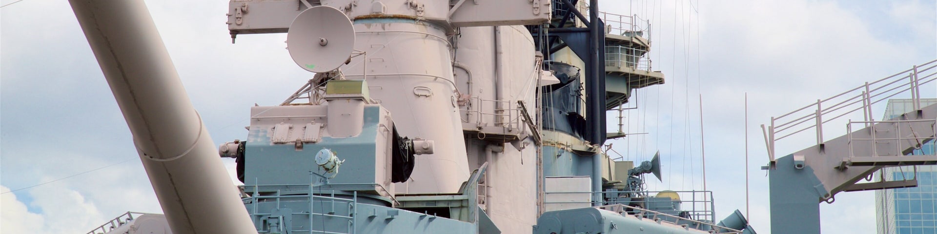 USS Wisconsin BB-64 showing military items and a bay or harbor