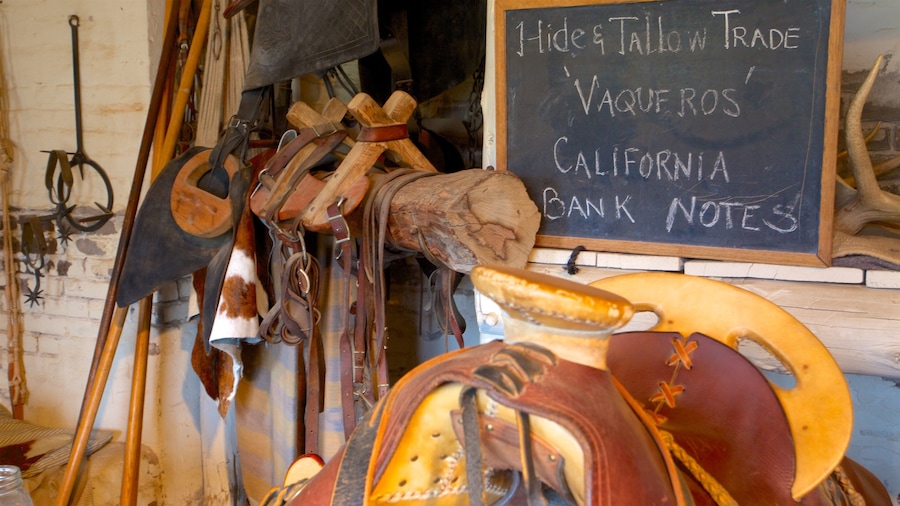 Fort Sutter State Historical Park featuring interior views, a garden and signage