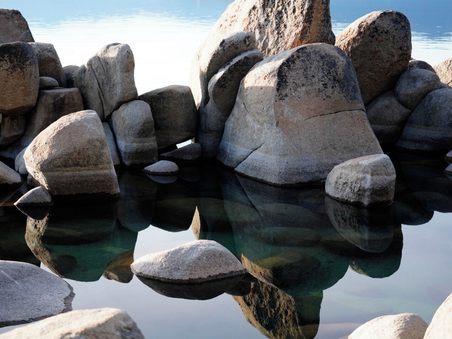 Sand Harbor at Lake Tahoe. Take the trail all the way to the right and down through to the rocks. The water was like glass at sunset. Handheld shot.