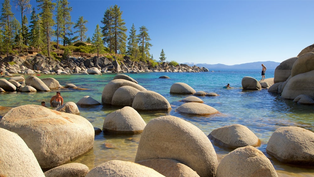 Sand Harbor which includes swimming, rugged coastline and general coastal views