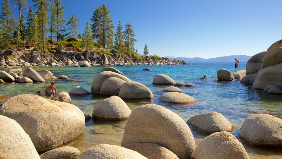 Sand Harbor which includes swimming, rugged coastline and general coastal views
