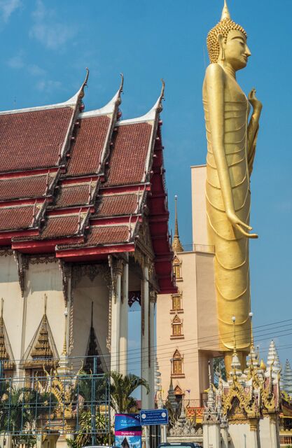 This standing 60meter high Buddha is the highest standing Buddha in Thailand. 

The inside is hollow and it is possible to climb to the top. However it was not open when I was there.

In comparison the big Buddha at Wat Intharawihan is 32 metres high.