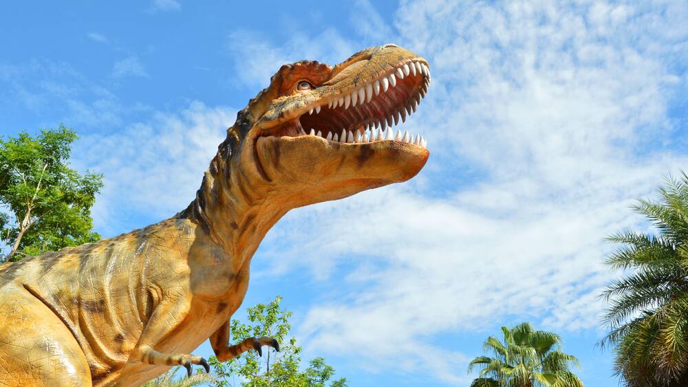 dinosaur in tropical forest garden in Kalasin of Thailand