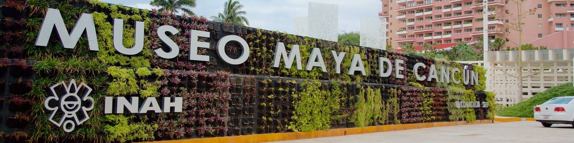 Maya Museum of Cancun featuring a garden and signage