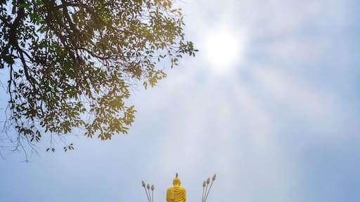 The entrance to Wat Tham Erawan temple is an elephant statue raising a Buddha statue