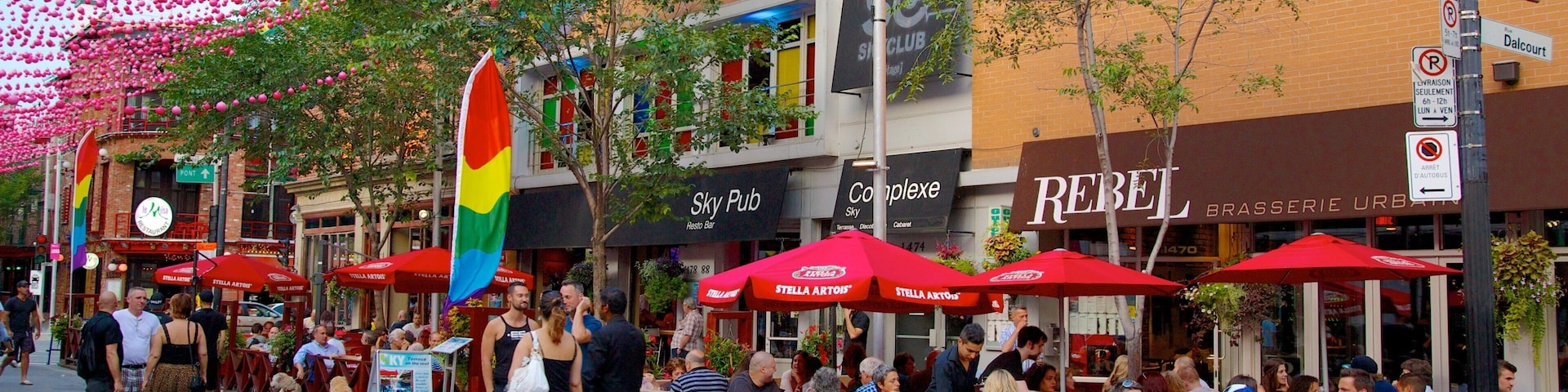 The Village showing a bar, a city and street scenes