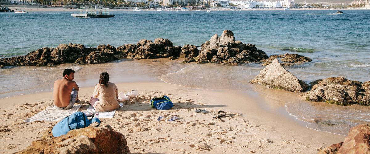 Cannery Beach which includes general coastal views and a beach as well as a couple