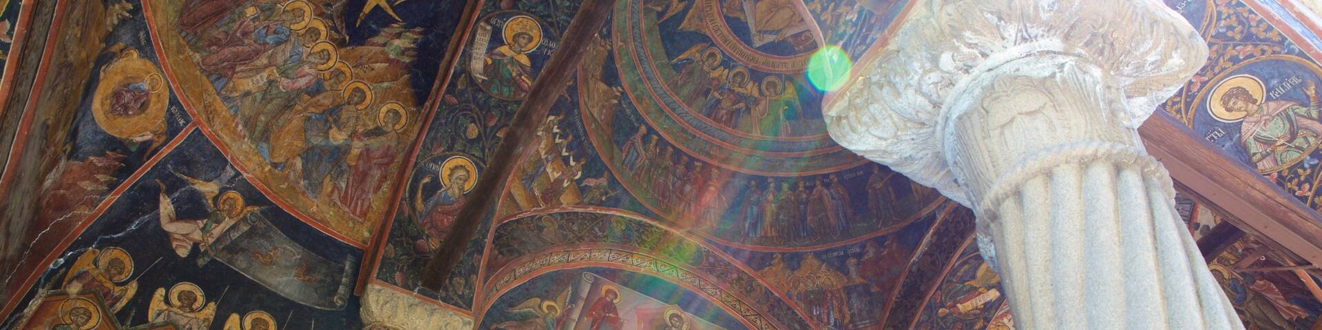 Cozia Monastery featuring interior views, a church or cathedral and heritage architecture