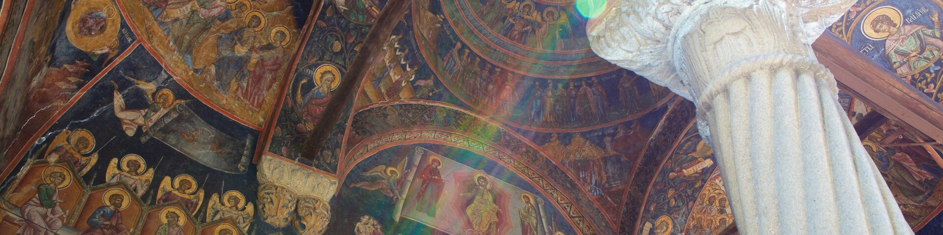 Cozia Monastery featuring interior views, a church or cathedral and heritage architecture