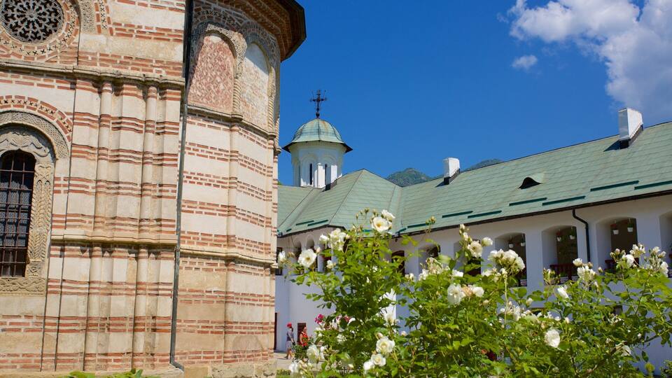 A historic church with intricate brickwork and a dome.