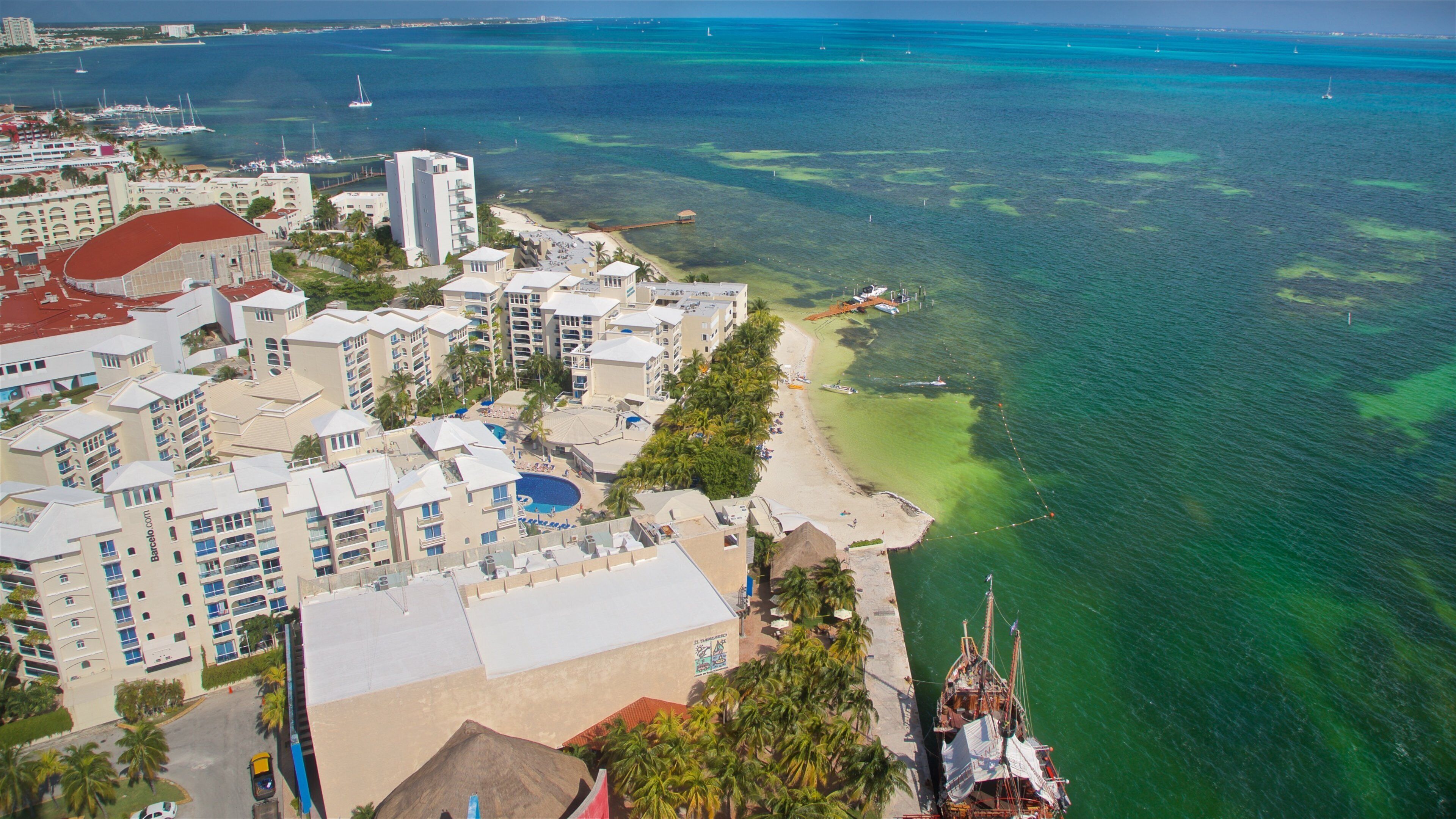 Escénica Tower featuring a coastal town and landscape views