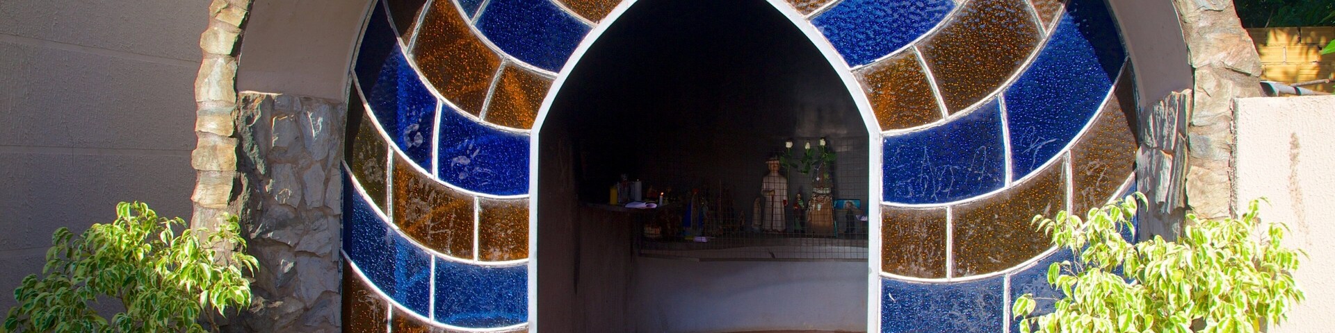 Cathedral of St. John the Baptist featuring a small town or village, a city and a church or cathedral