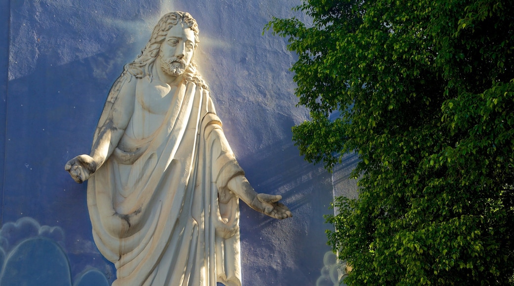 Cathedral of St. John the Baptist which includes a statue or sculpture, a city and religious aspects