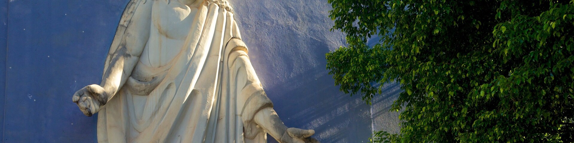 Cathedral of St. John the Baptist which includes a statue or sculpture, a city and religious aspects