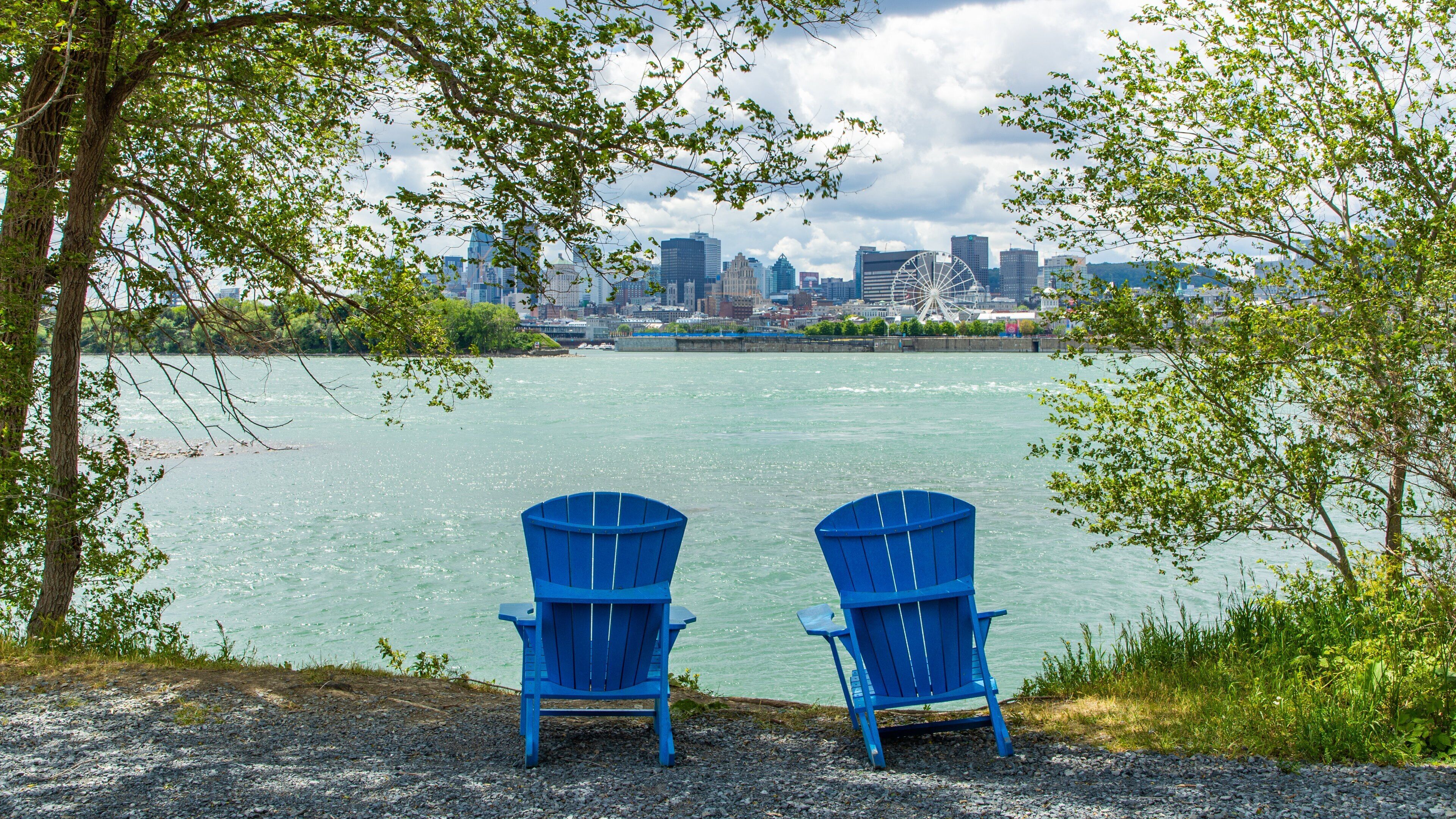 Parc Jean-Drapeau featuring a bay or harbor and a garden