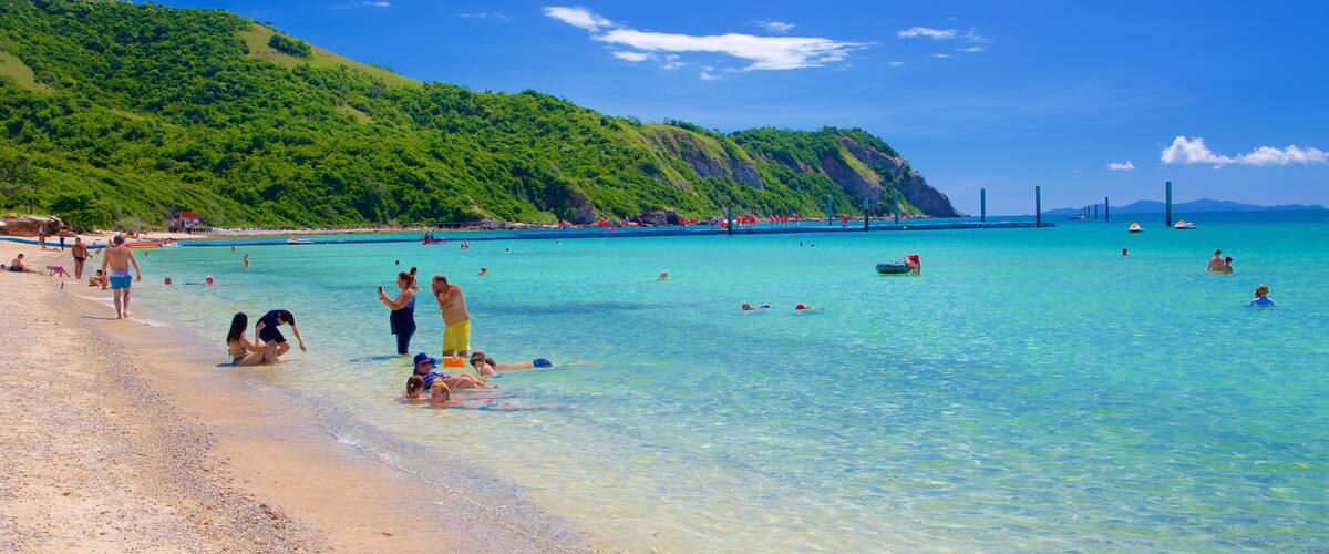 Samae Beach featuring a beach as well as a small group of people