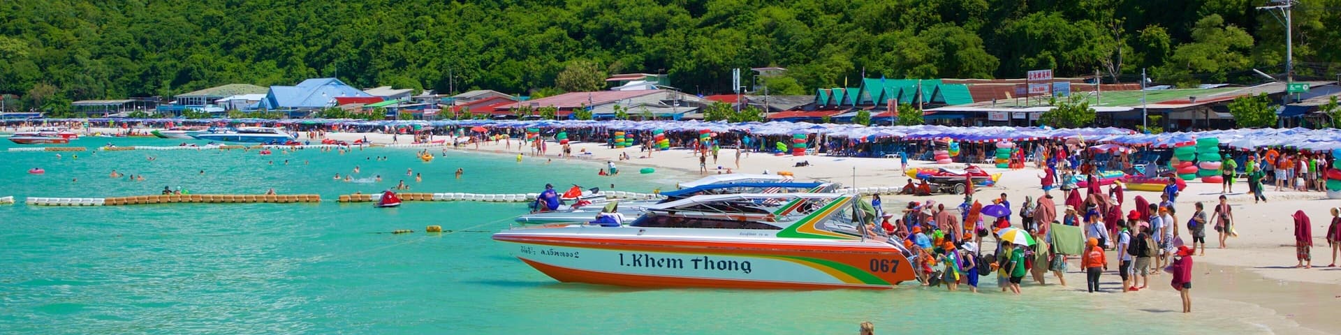 Ta-Yai Beach featuring boating and a sandy beach as well as a large group of people