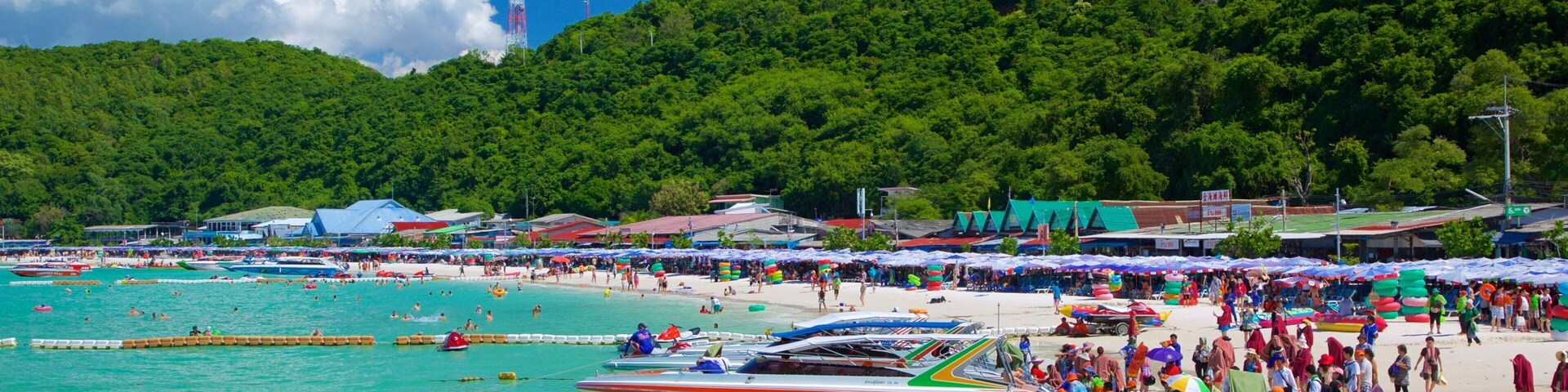 Ta-Yai Beach featuring boating and a sandy beach as well as a large group of people