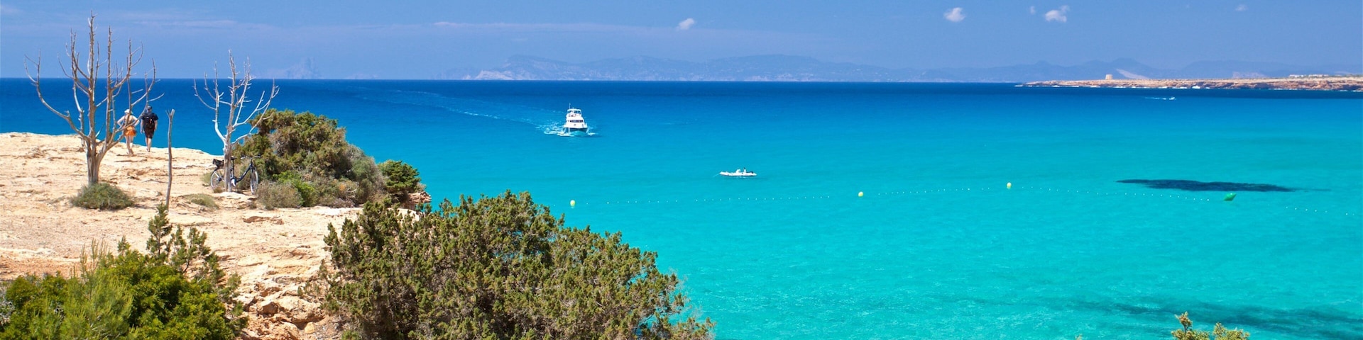 Cala Saona featuring rocky coastline and general coastal views