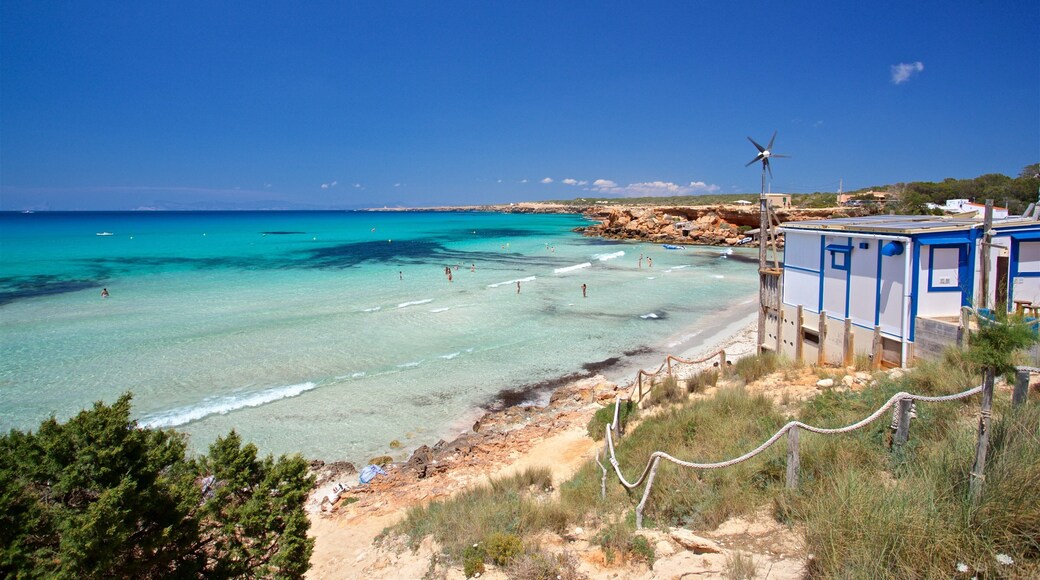 Cala Saona showing a beach and general coastal views