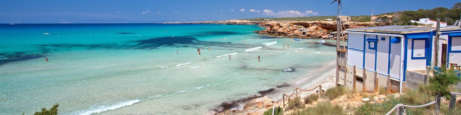 Cala Saona showing a beach and general coastal views