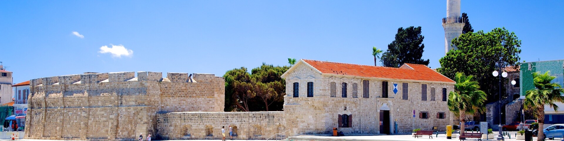 Larnaka Medieval Castle featuring a sandy beach and heritage architecture