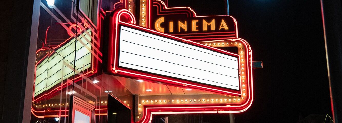 Generic Movie Theater in Small Town with Blank Marquee To Add Your Own Text