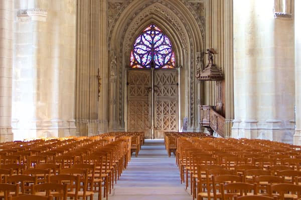 Saint-Vulfran Cathedral showing heritage elements, a church or cathedral and interior views