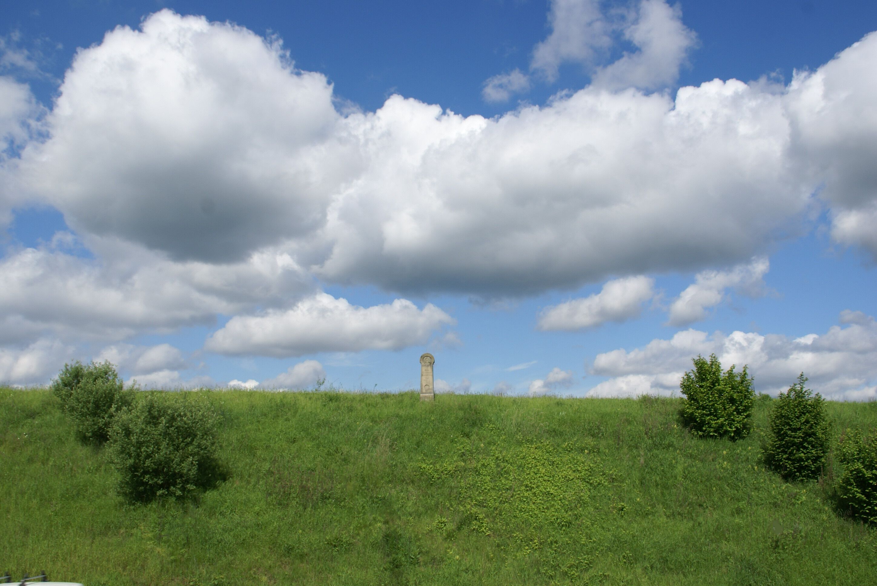 The old milestone on its unique place above the busy Bundesstraße 56 in the district Impekoven of the community Alfter