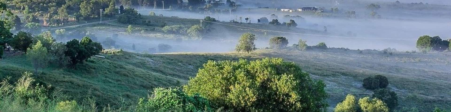 Early morning mist across the valley taken from mountain view drive just off the warrigo highway looking across to Hatton vale Queensland.
