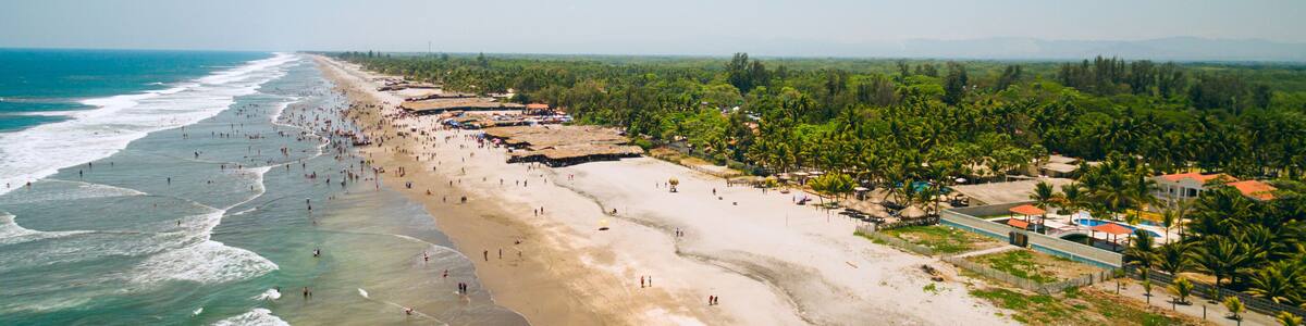 An aerial view of the shoreline of the Costa del Sol beach in La Paz, El Salvador.