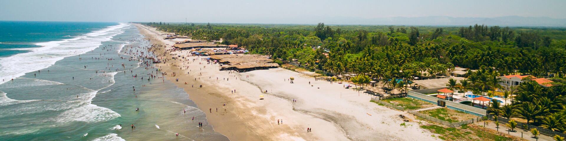 An aerial view of the shoreline of the Costa del Sol beach in La Paz, El Salvador.