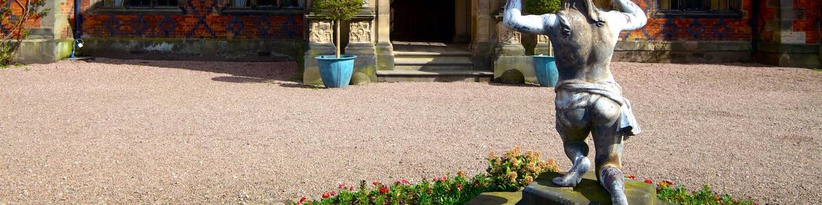 Arley Hall And Gardens featuring heritage architecture and a statue or sculpture