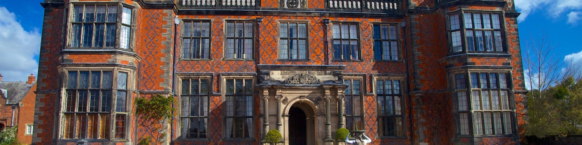 Arley Hall And Gardens showing wildflowers, a house and heritage architecture