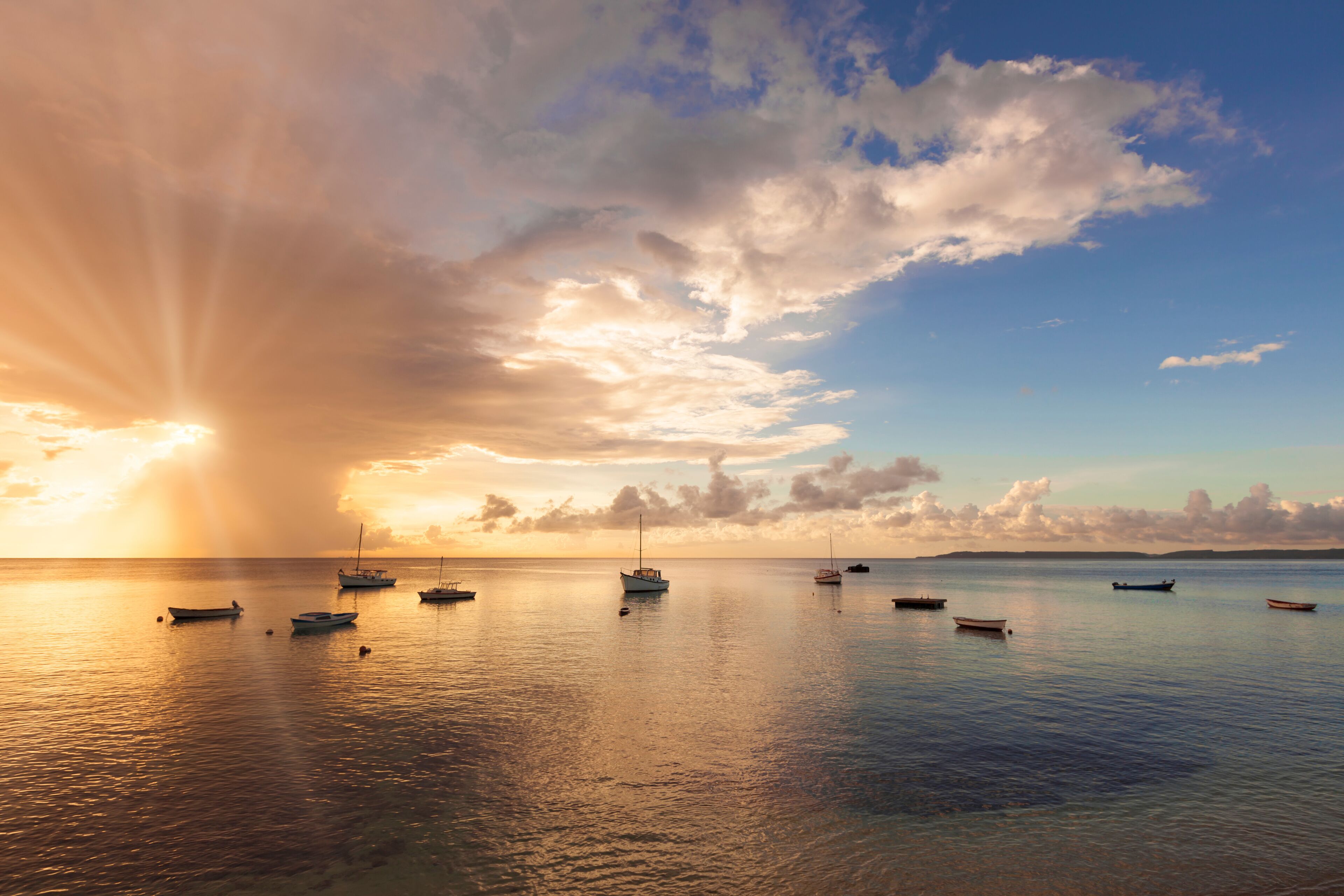 Caribbean Sea sunset with fishing boats