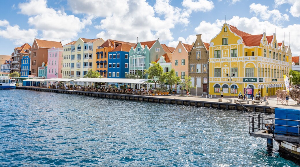 Famous colorful waterfront buildings in dutch-caribbean, colonial style viewed from the Queen-Emma-Bridge in Willemstad, Curacao