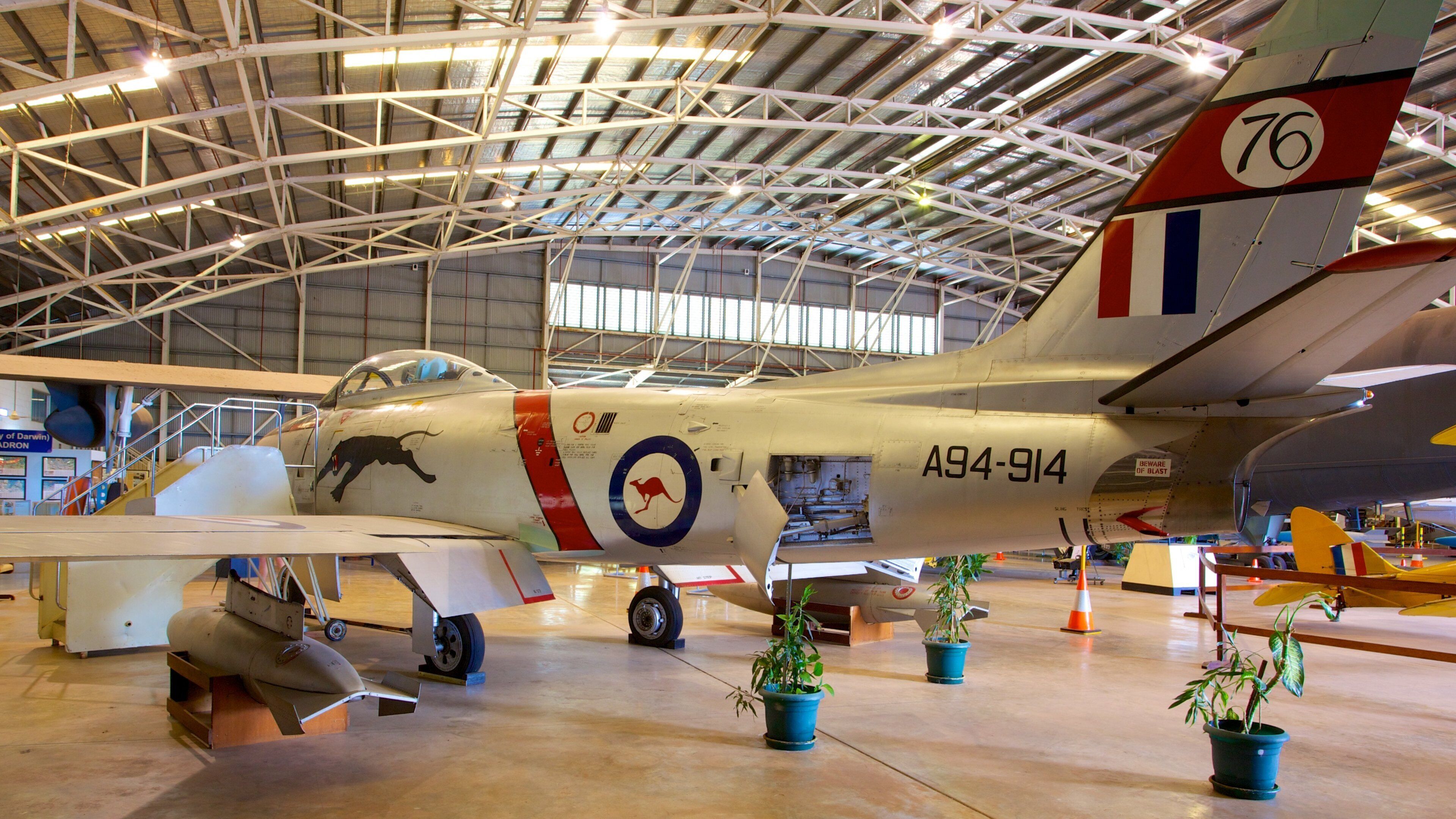 Darwin Aviation Museum featuring interior views and aircraft